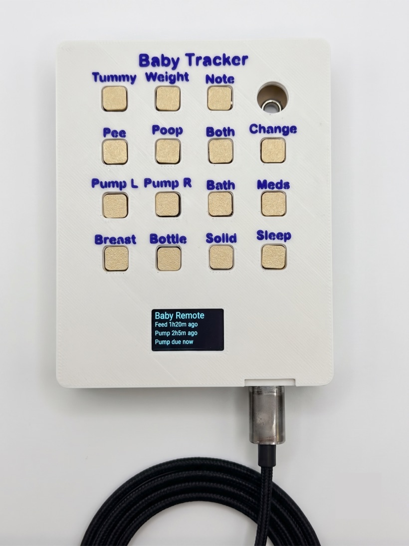 3D-printed baby remote with an embossed faceplate over 15 buttons and a 0.96-inch OLED status display